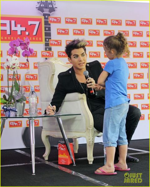 adam-lambert-hugs-lucky-young-fan-in-south-africa-01.jpg