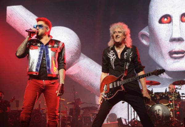 vocalist-adam-lambert-and-guitarist-brian-may-of-queen-adam-lambert-picture-id803725756.jpg